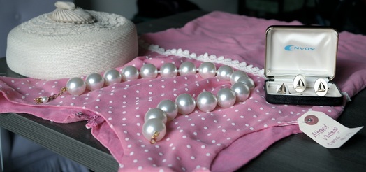 Vintage dress, pearls, hat, and cuff links